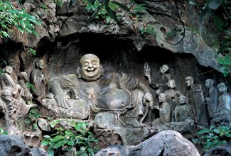 The Buddha statue in a cave of Flying Rock,Hangzhou,China