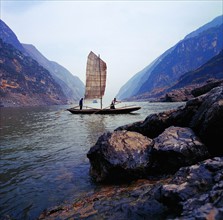 A boat sailing on the Wu Section of Three Gorges of Yangtse River,China
