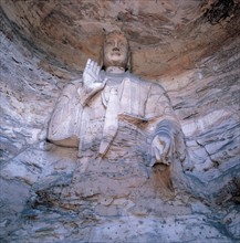 A statue of Buddha at Yungang Grotto,Shanxi Province,China