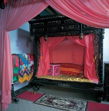 A wood carving bed at Manor of Kang Baiwan,China