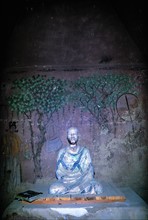 A Buddha Statue at Mogao Grottoes,Dunhuang,Gansu Province,China