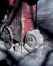 Stone drum in the doorway of Siheyuan courtyard,Beijing,China