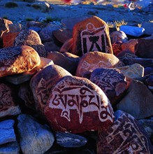 Mani Stone on the bank of Mapam Yumco, Tibet,China