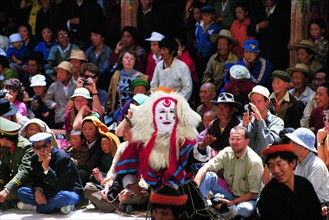 Visiters watch Tibetan Opera in Drepung Monastery, Tibet,China