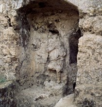 Niche excavated from rock