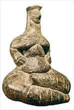 R-FIGURA DE MUJER SENTADA-NEOLITICO GRIEGO.PROC DE HIERAPETRA  S V AC
VOLOS, MUSEO
GRECIA