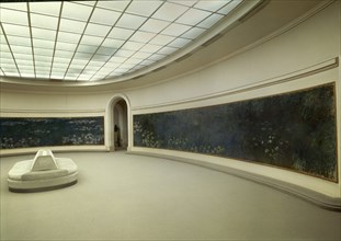 Interior view of a room in the musée de l'Orangerie in Paris: Water lilies by Claude Monet
