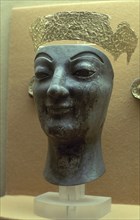 CABEZA DE MUJER (ARTEMIS?) EN MARFIL CON CORONA DE ORO
DELFOS, MUSEO
GRECIA

This image is not
