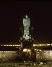 GOMEZ DEL RIO BERNABE
ESCULTURA DE S RAFAEL AL LADO DEL GUADALQUIVIR-NOCTURNA
CORDOBA,