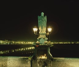 GOMEZ DEL RIO BERNABE
ESCULTURA DE S RAFAEL AL LADO DEL GUADALQUIVIR-NOCTURNA
CORDOBA,