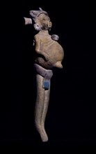 Sculpture d'une femme maya enceinte