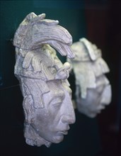 Earthenware sculpture of a priest's head