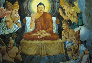 Mural depicting Gautama Buddha on the divine throne surrounded by angels