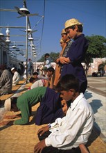 The various prayer positions in a mosque in Pakistan