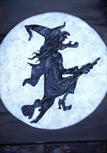 Classic Wicca image of a crone riding on her broomstick