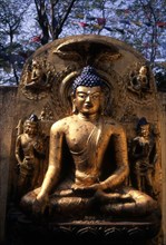 Statue représentant l'illumination de Bouddha, assis dans la position de la prise de la terre à témoin (bhûmisparsa mudrâ), à Bodhgaya, en Inde