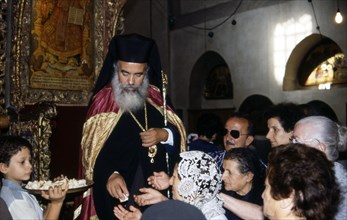 Communion grecque orthodoxe en l'église de la Nativité, Bethléem