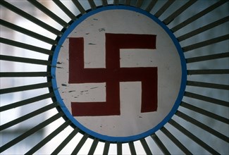 Swastika sign on a temple gate, India