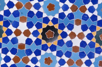 Glazed tiles adorning the brickwork of the Shiraz Persian mosque, Iran