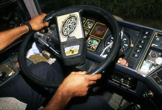 Qur'anic verse on a steering wheel of a bus