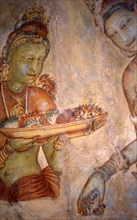 Fresques bouddhistes (peintures rupestres), offrande du lotus, à Sigiriya, Sri Lanka (5e siècle)