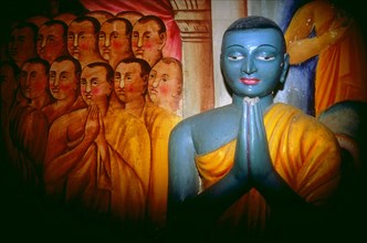 Statue de Bouddha peinte en bleue