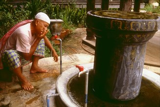 Ablutions before prayer, in Thailand