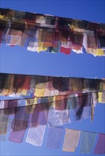Buddhist prayer texta hanging outside a temple in Nepal