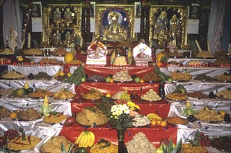 Hindu temple altar laden with food and fruits for Divali