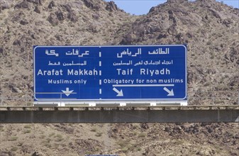 Roads sign warning non-Muslims away from the turn-off to Mecca in Saudi Arabia