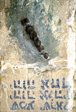 Mezuzah sunk in a doorport of a house in Mea Shearim in Jerusalem