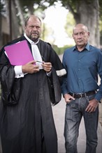Loïc Sécher with his lawyer Eric Dupond-Moretti