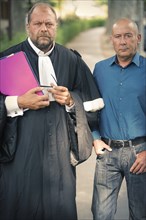 Loïc Sécher with his lawyer Eric Dupond-Moretti