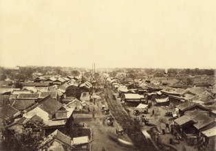 Vue de rue dans la cité tartare prise de Ha-Ta-Men aux environs de Pékin (Chine)