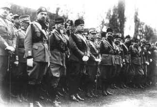 King of Italy, Mussolini and Marshal Badoglio attending a military ceremony