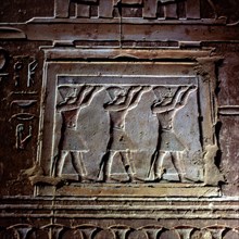 Deir el-Medina, Ptolemaic temple, left-hand chapel - the barque of Sokaris, detail of its altar of repose, the raising of the sky by Pharaoh