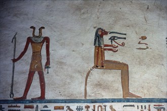Tomb of Ramses VI. Seated baboon, Oudjat bearer, and god with a double-serpent head
