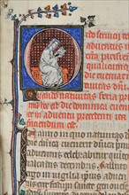 Cleric reading "In Ecclesia parisiensis"