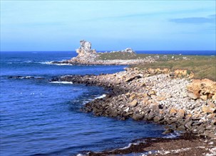 View from the environs of Pointe de Saint-Gonvel towards the Le Coq rock and point. High tide