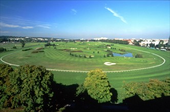 View from the buidling across from the golf course, Rue du Camp Canadien, towards the racetrack and golf course