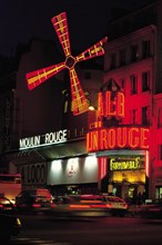 Moulin Rouge cabaret by night, Paris