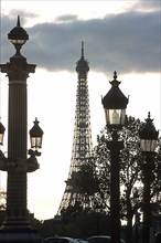 Street lamps on the Champ de mars and the Eiffel Tower, perspective