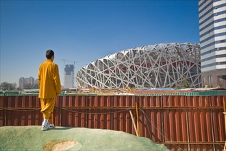 Moine Shaolin sur le chantier du site olympique de Pékin