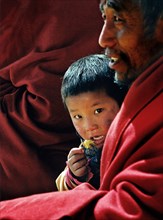 Tibet: lama with a boy