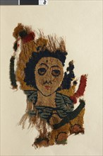 Coptic textile adorned with the face of a woman