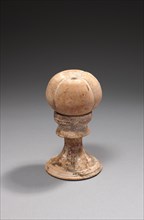 Hellenistic pomegranate on a base