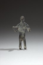 Cananean statuette figuring a stylized orant