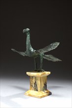Statuette figuring a bird