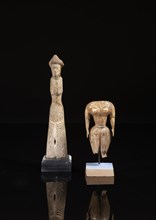 Roman statuette figuring a woman and parthian female statuette