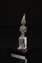 Cananean statuette figuring a seated divinity